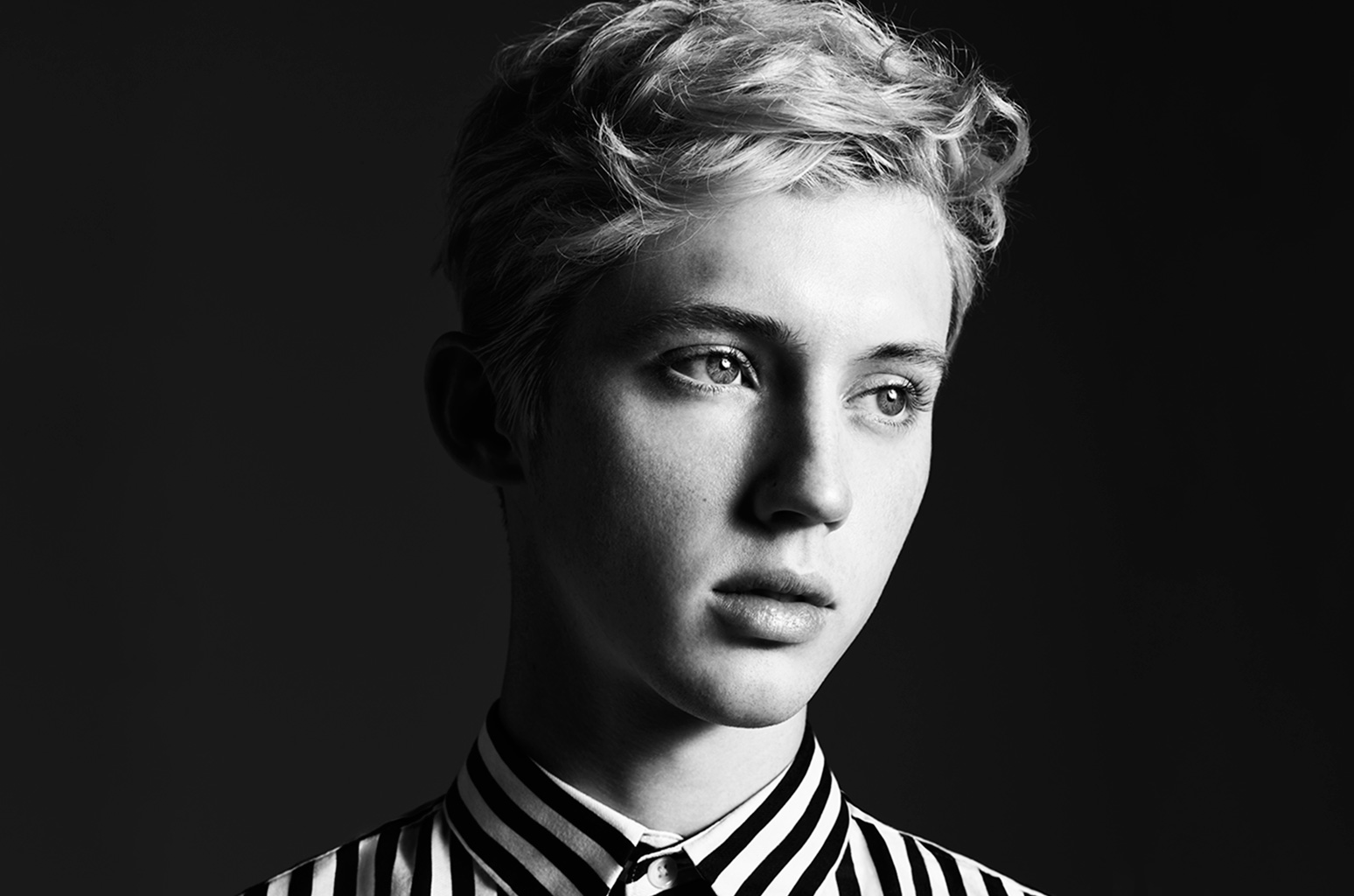 Troye Sivan embraces sexuality in "Bloom," queer musician, album review, by the queer magazine, OutWrite Newsmagazine