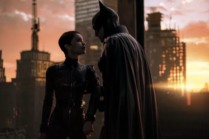 still from The Batman showing Batman and Catwoman on a rooftop in Gotham