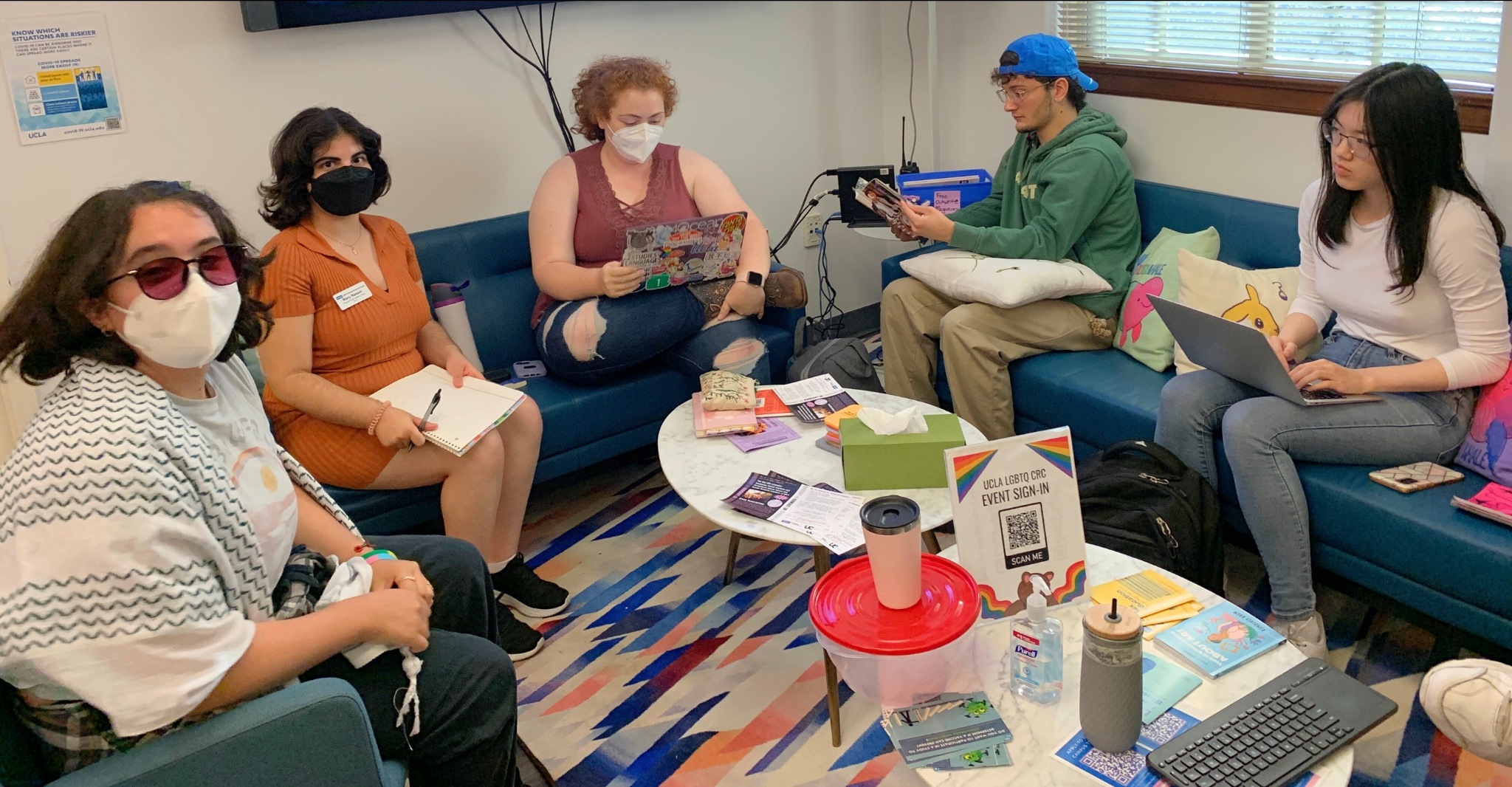 A photo of several participants in the Queer Writing Space